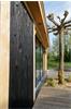 Grote foto houten tuinkamer tuin en terras veranda en overkappingen