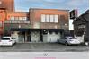 Winkelpand met twee appartementen