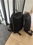 TUMI McLaren Torque Sling en Velocity Rugzak