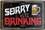 Reclamebord: Sorry we're drinking