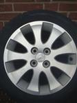 15 Daihatsu lichtmetalen velgen met Banden 4x100