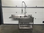 (27) Inox dubbele afwasbak met kraan.