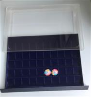 3 Showcases voor 150 champagnecapsules •