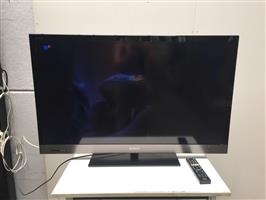 (5) Flatscreen tv Sonny met de afstandsbediening
