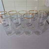 9 oude glazen stella artois.