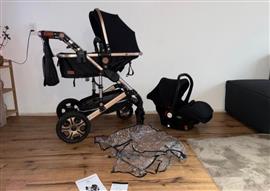 Mooie kinderwagen met maxicosi