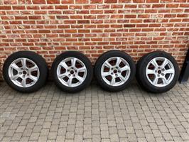 4-seizoensbanden met lichtmetalen velgen te koop