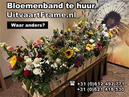 Bloemenband te huur om uitvaartkist op te fleuren