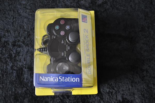 Grote foto playstation 2 controller nanica station spelcomputers games overige