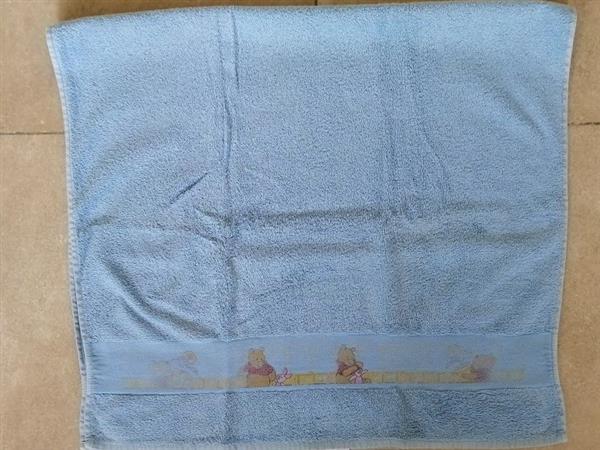 Grote foto vintage blauwe badhanddoek van winnie the pooh verzamelen disney