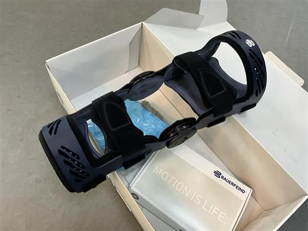 Grote foto knieorthese bauerfeind maat 3 rechts blauw zakelijke goederen gezondheid