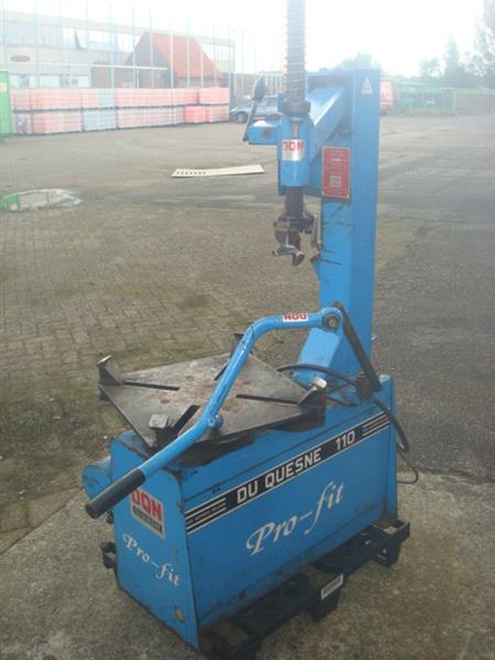 Grote foto banden demontage apparaat blauw du quesne 110 auto diversen gereedschap