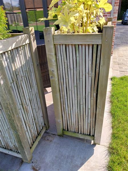 Grote foto 2 grote bloembakken op wieltjes tuin en terras bloembakken
