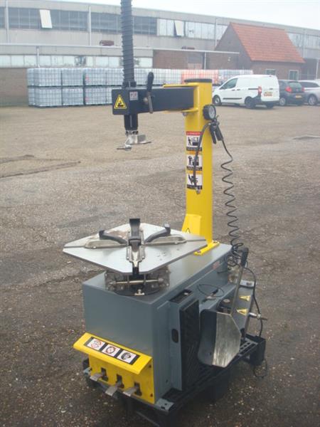Grote foto banden demonteer apparaat 220v geel grijs auto diversen gereedschap