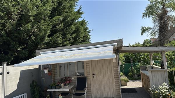 Grote foto luifel omnistore caravans en kamperen camper