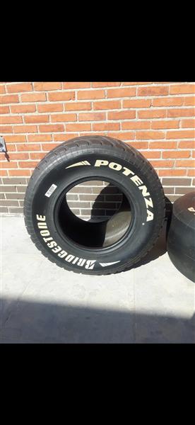 Grote foto bridgestone f1 banden auto onderdelen banden en velgen