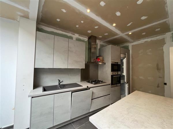 Grote foto betonlookkeuken met eiland. huis en inrichting keukens