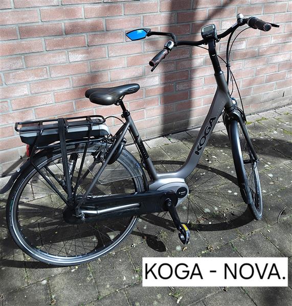 Grote foto e byke. koga. fietsen en brommers damesfietsen