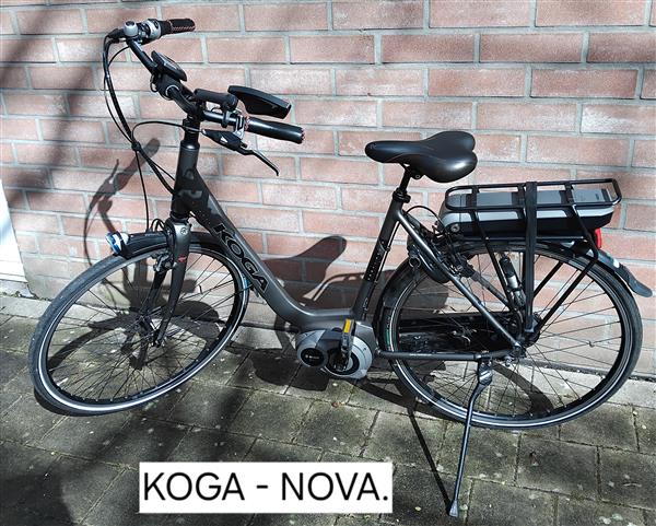 Grote foto e byke. koga. fietsen en brommers damesfietsen