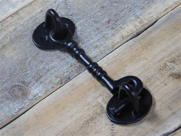 Grote foto een mooie windhaak mat zwarte smeedijzeren haak doe het zelf en verbouw materialen en producten