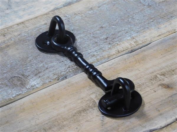 Grote foto een mooie windhaak mat zwarte smeedijzeren haak doe het zelf en verbouw materialen en producten