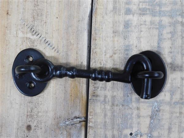 Grote foto een mooie windhaak mat zwarte smeedijzeren haak doe het zelf en verbouw materialen en producten