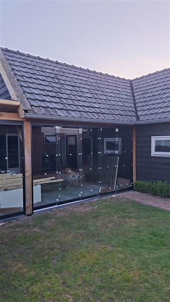 Grote foto schuifwanden op maat tuin en terras veranda en overkappingen