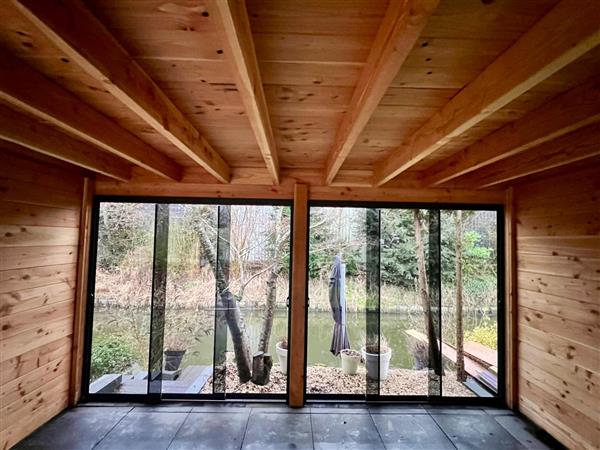 Grote foto schuifwanden op maat tuin en terras veranda en overkappingen