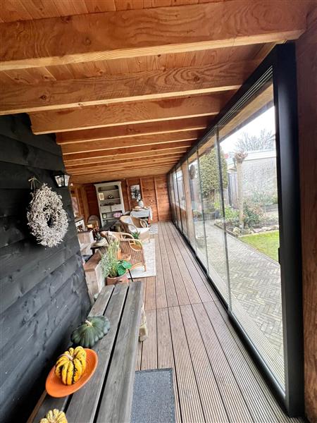 Grote foto schuifwanden op maat tuin en terras veranda en overkappingen