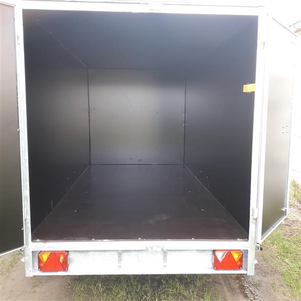 Grote foto gesloten aanhangwagen met valdeur en alu velg auto diversen aanhangers