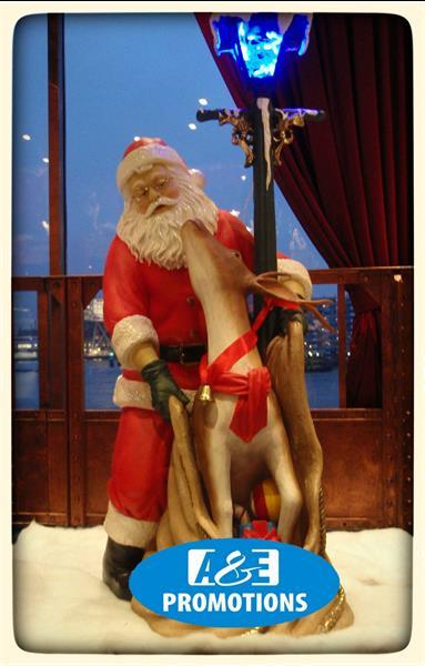 Grote foto slee etalering huren kerstman figuur oostende diensten en vakmensen marketing en reclame