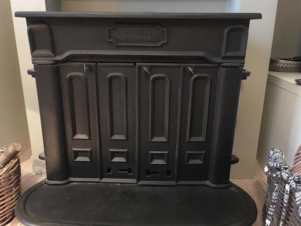 Grote foto antieke houtkachel godin colonial doe het zelf en verbouw verwarming radiatoren