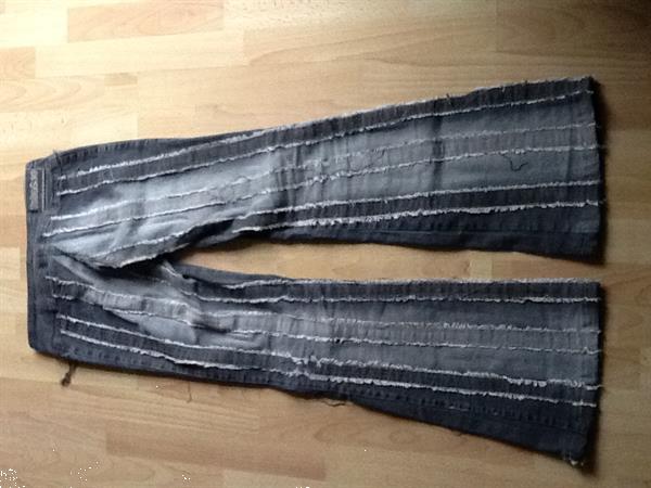 Grote foto jeansbroek met verticale franjes blauw wit kleding dames spijkerbroeken en jeans