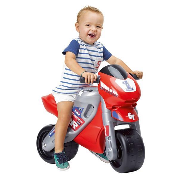 Grote foto feber loopmotor met helm kinderen en baby los speelgoed
