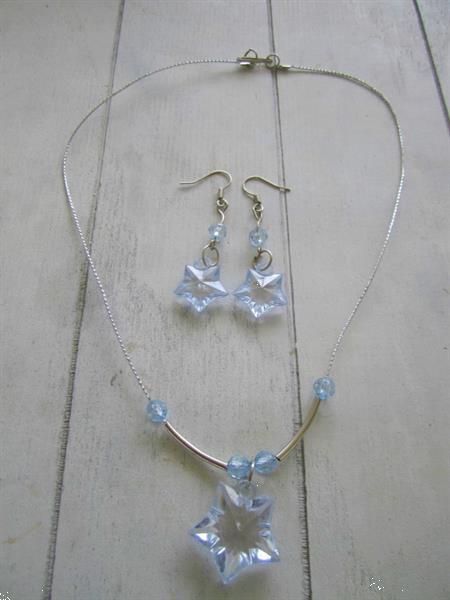 Grote foto set oorbellen en halsketting met blauwe sterretjes sieraden tassen en uiterlijk oorbellen