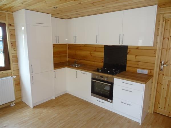 Grote foto houten spa chalet met sauna caravans en kamperen stacaravans