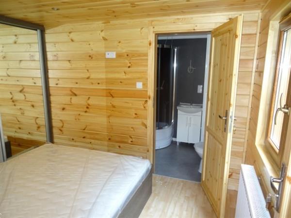 Grote foto houten spa chalet met sauna caravans en kamperen stacaravans