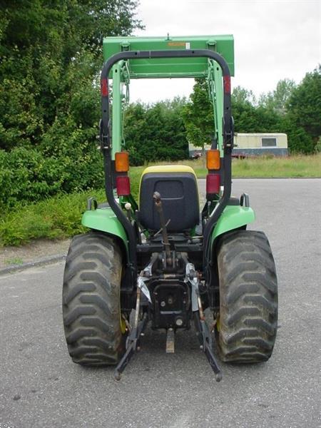 Grote foto john deere 4310 load agrarisch tractoren