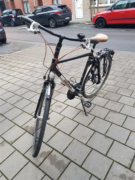 Grote foto stijlvolle koga herenfiets fietsen en brommers herenfietsen