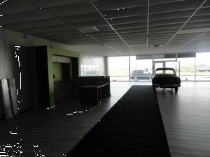 Grote foto baanwinkel regie tienen bedrijfspanden showroom te koop