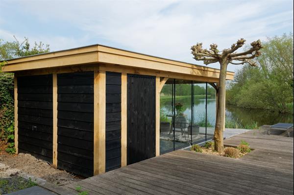 Grote foto houten tuinkamer tuin en terras veranda en overkappingen