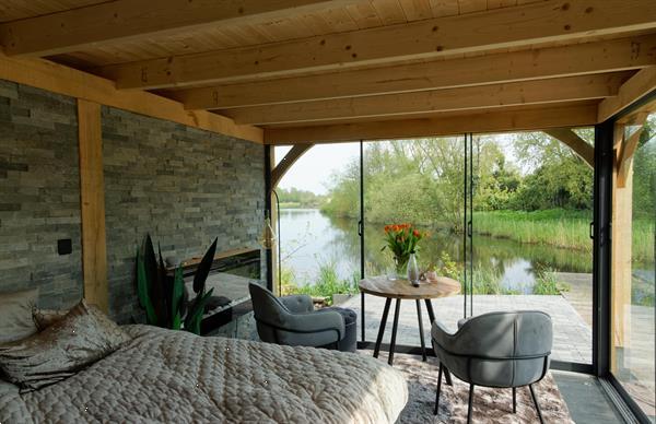 Grote foto houten tuinkamer tuin en terras veranda en overkappingen