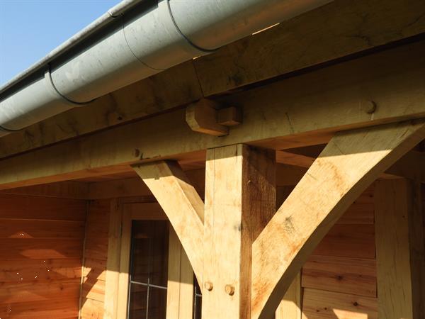 Grote foto houten tuinhuis met veranda op maat gemaakt. tuin en terras tuinhuisjes en blokhutten
