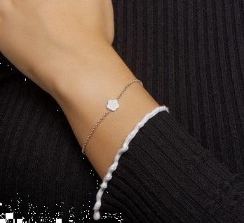 Grote foto zilveren jasseron armband met bloemvormig plaatje kleding dames sieraden