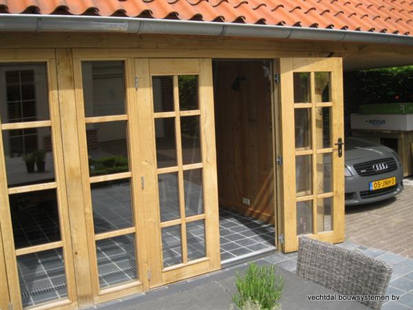 Grote foto stijlvolle eiken bijgebouw op maat gemaakt. tuin en terras tuinhuisjes en blokhutten