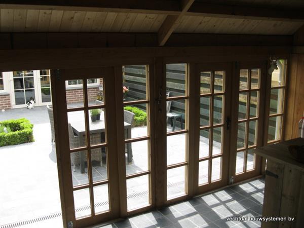 Grote foto stijlvolle eiken bijgebouw op maat gemaakt. tuin en terras tuinhuisjes en blokhutten