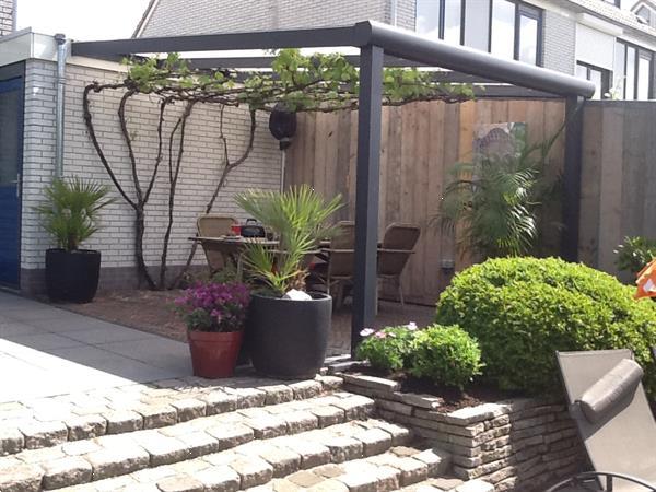 Grote foto luxe plus zwart structuur terrasoverkapping tuin en terras veranda en overkappingen