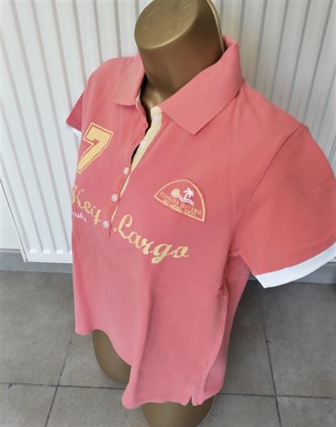 Grote foto pompelmoeskleurige polo met sportieve print kleding dames t shirts