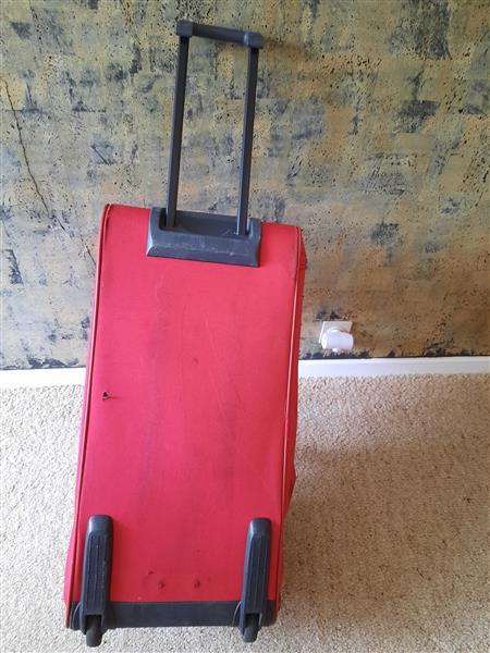 Grote foto rode reistas samsonite met wieltjes en handvat sieraden tassen en uiterlijk reistassen