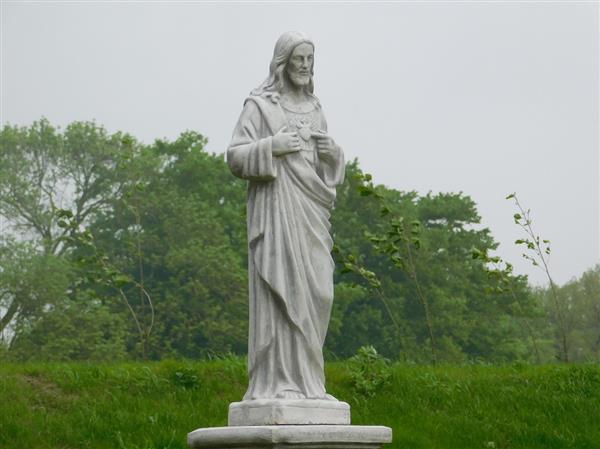 Grote foto jezus heilig hartbeeld vol steen tuin en terras tuindecoratie